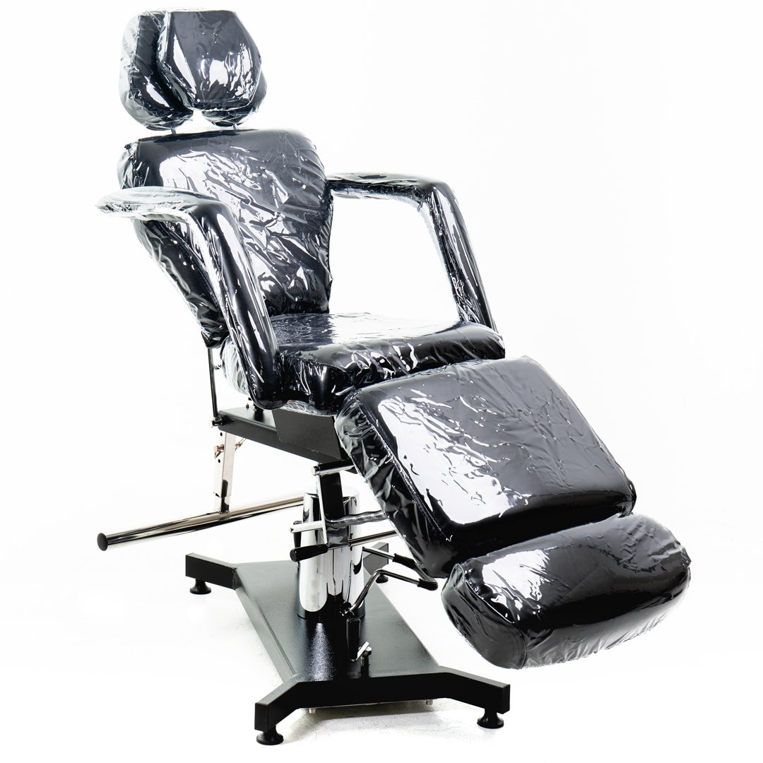 TATSoul 300 Slim Tattoo Client Chair right side view in upright sitting position wrapped in plastic protective cover