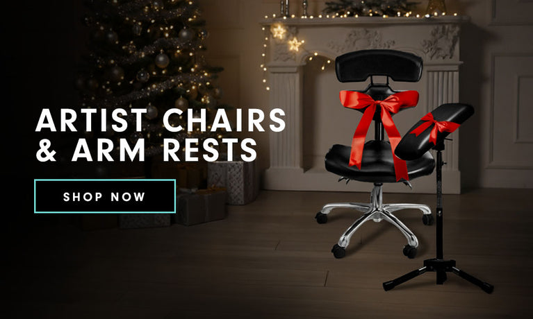 Artist chair and arm rest with red ribbons, next to shop now button.