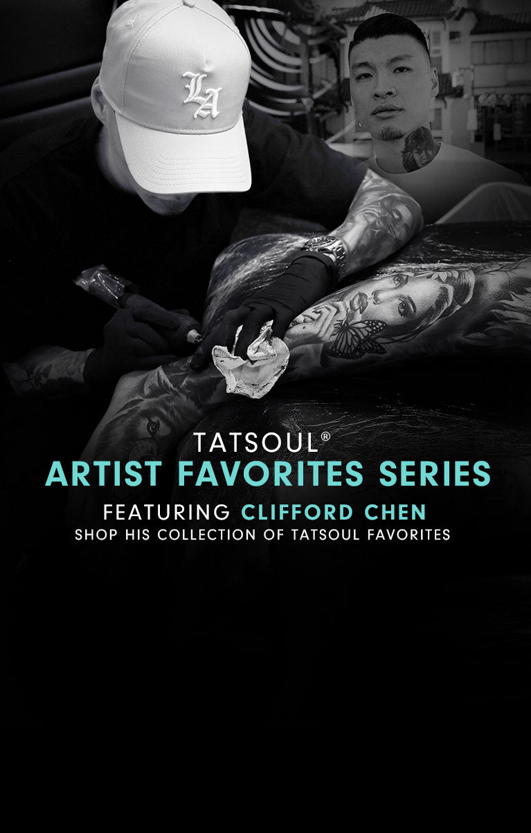 Tattoo artist working on a detailed portrait tattoo on a person's arm.