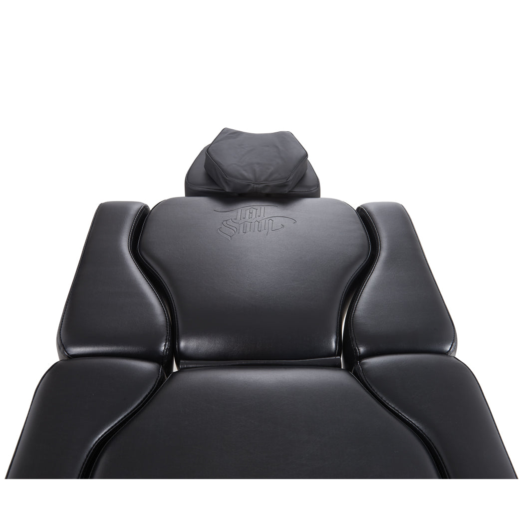 The Oros 680 tattoo chair for tattoo clients to sit comfortably during long tattoo sessions. 