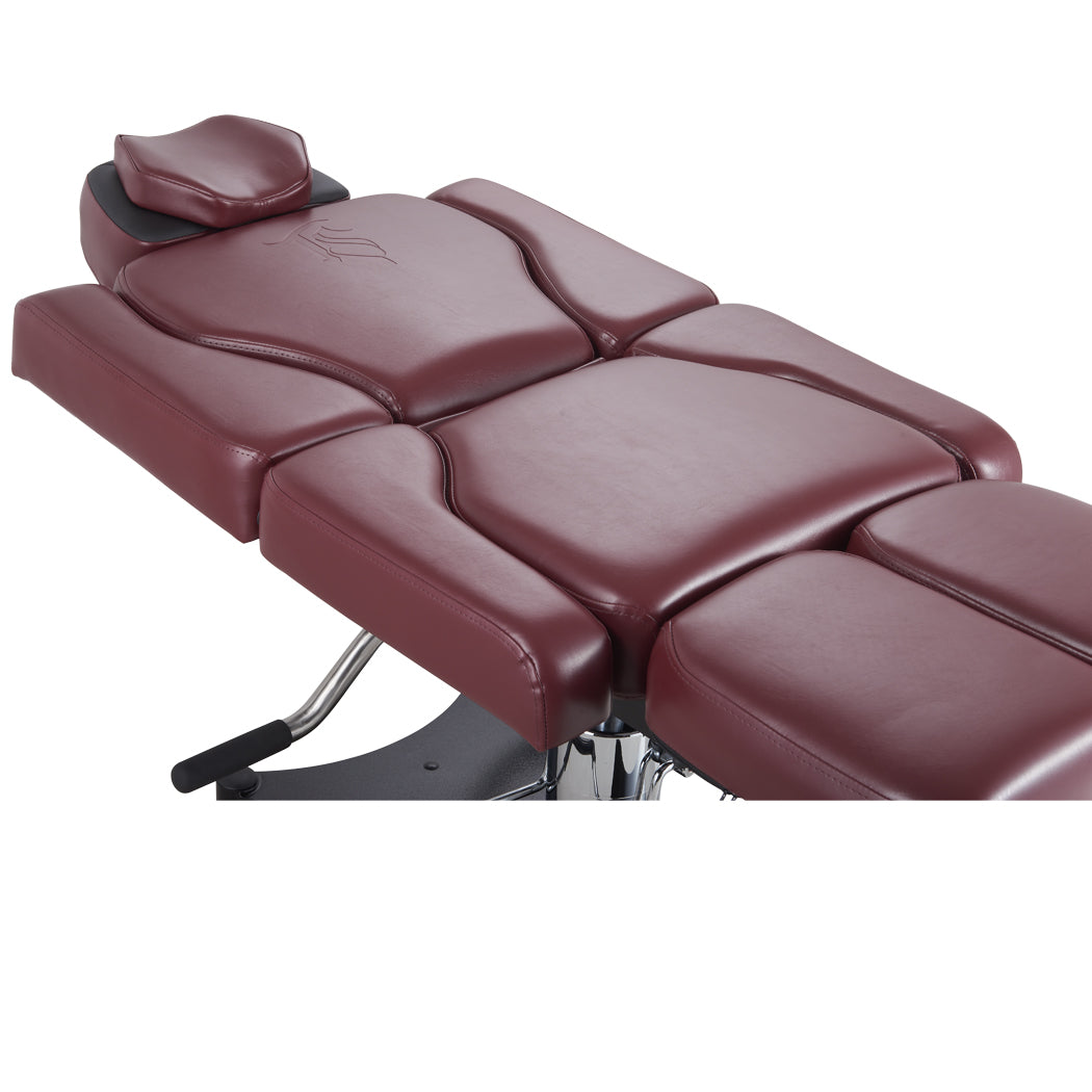 Oros 680 Tattoo Client Chair, Oxblood color, laid down showing top half.