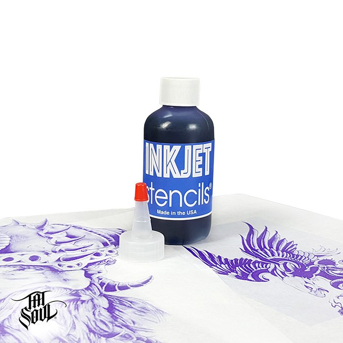 The InkJet Stencils Printer Ink squeeze bottle and lid on a white surface with purple stenciled art.
